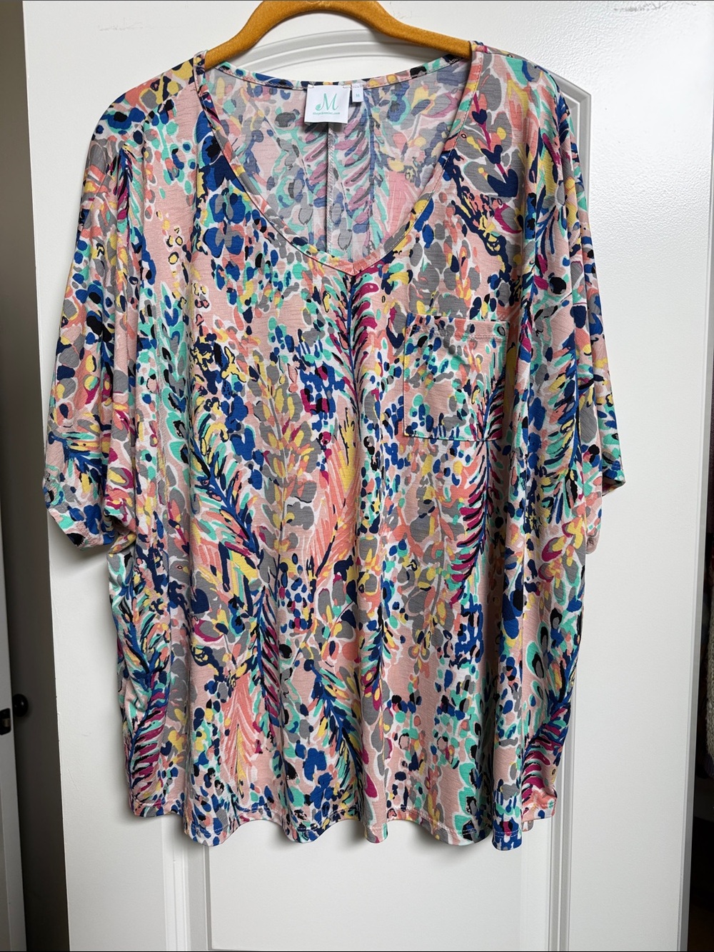 Shop The Mint Floral V-Neck Short Sleeve Tee in Pink Multicolor